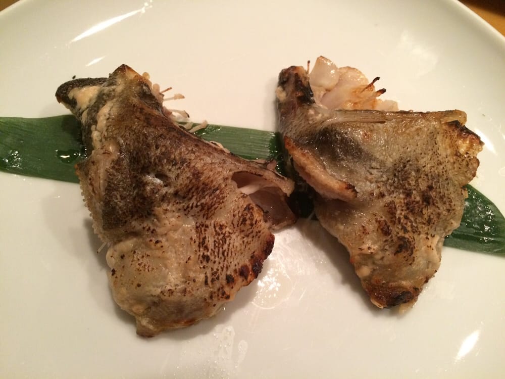 Grilled fish collars on a leaf