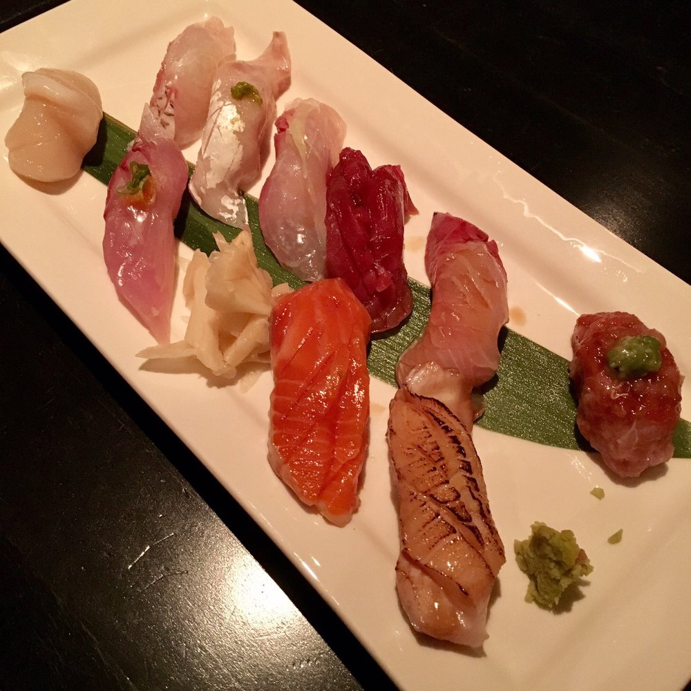 Omakase nigiri on a long plate