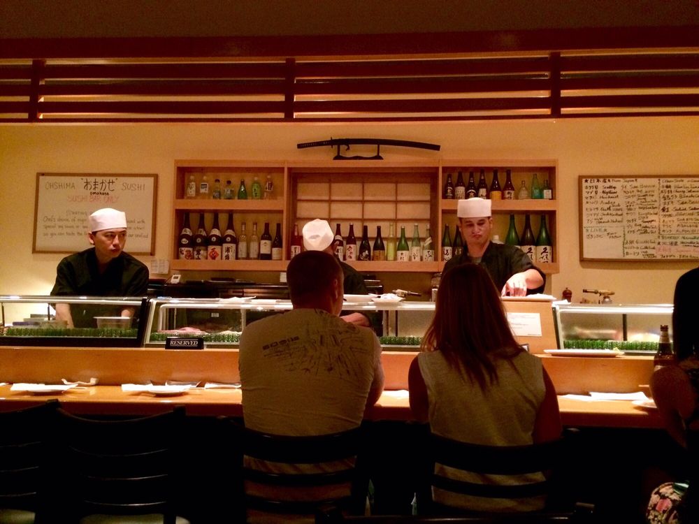 Sushi chefs at work behind the bar